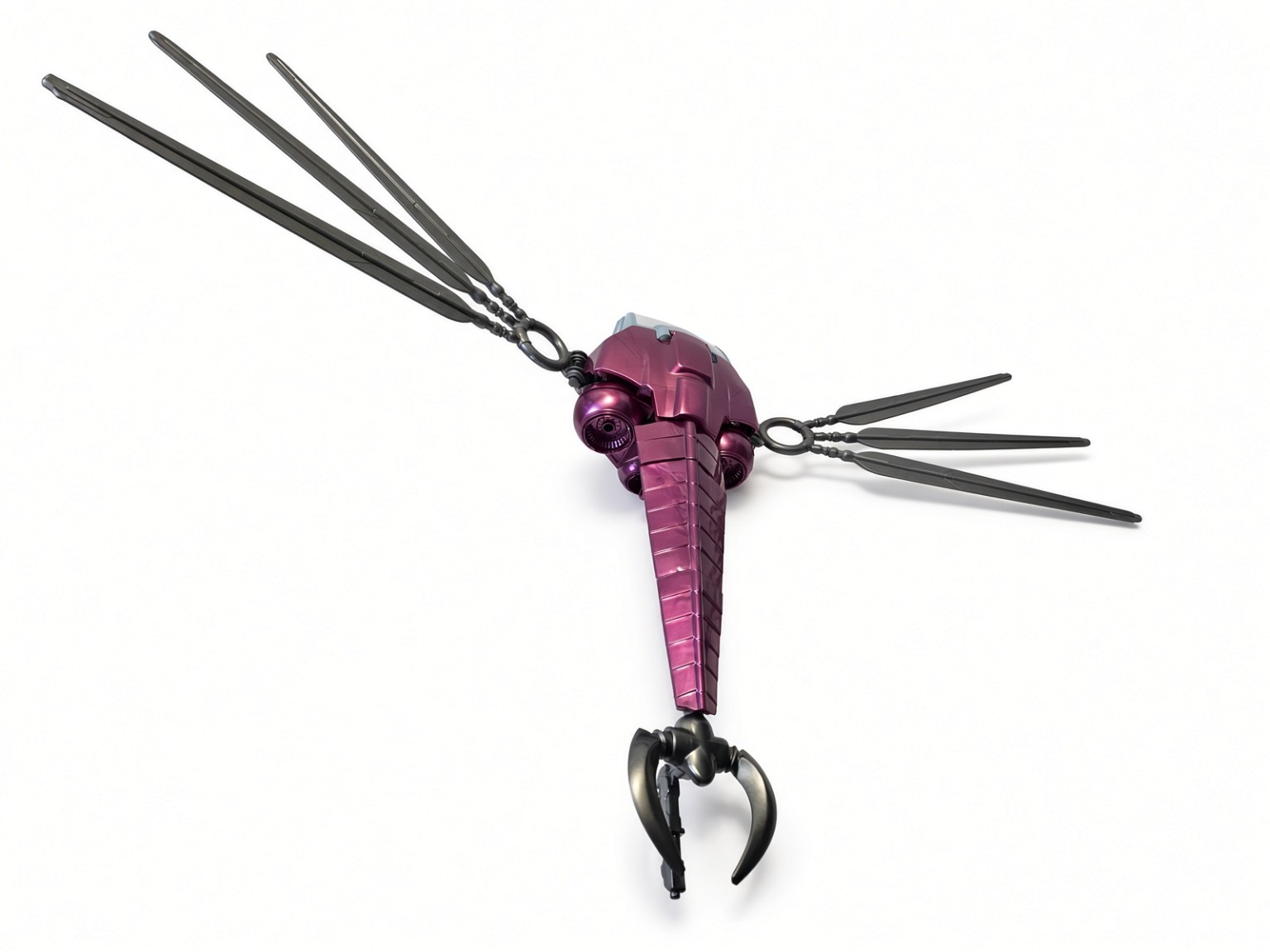 Rear angled view of assembled Fright Fighter showing long segmented purple tail, front claws and spread wings.