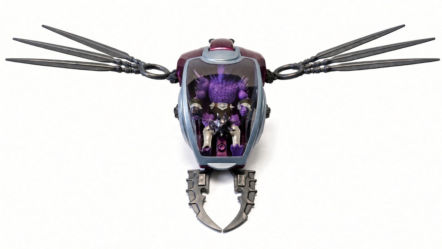 Front view of Spikor figure seated inside Fright Fighter cockpit beneath transparent canopy.