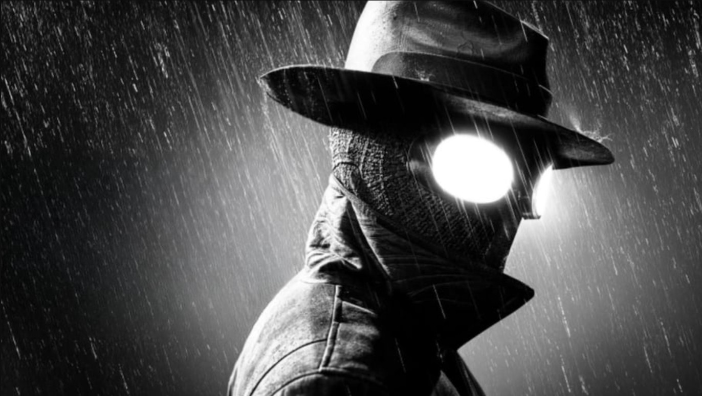 Spider-Noir in a fedora and trench coat standing in heavy rain with glowing white goggles