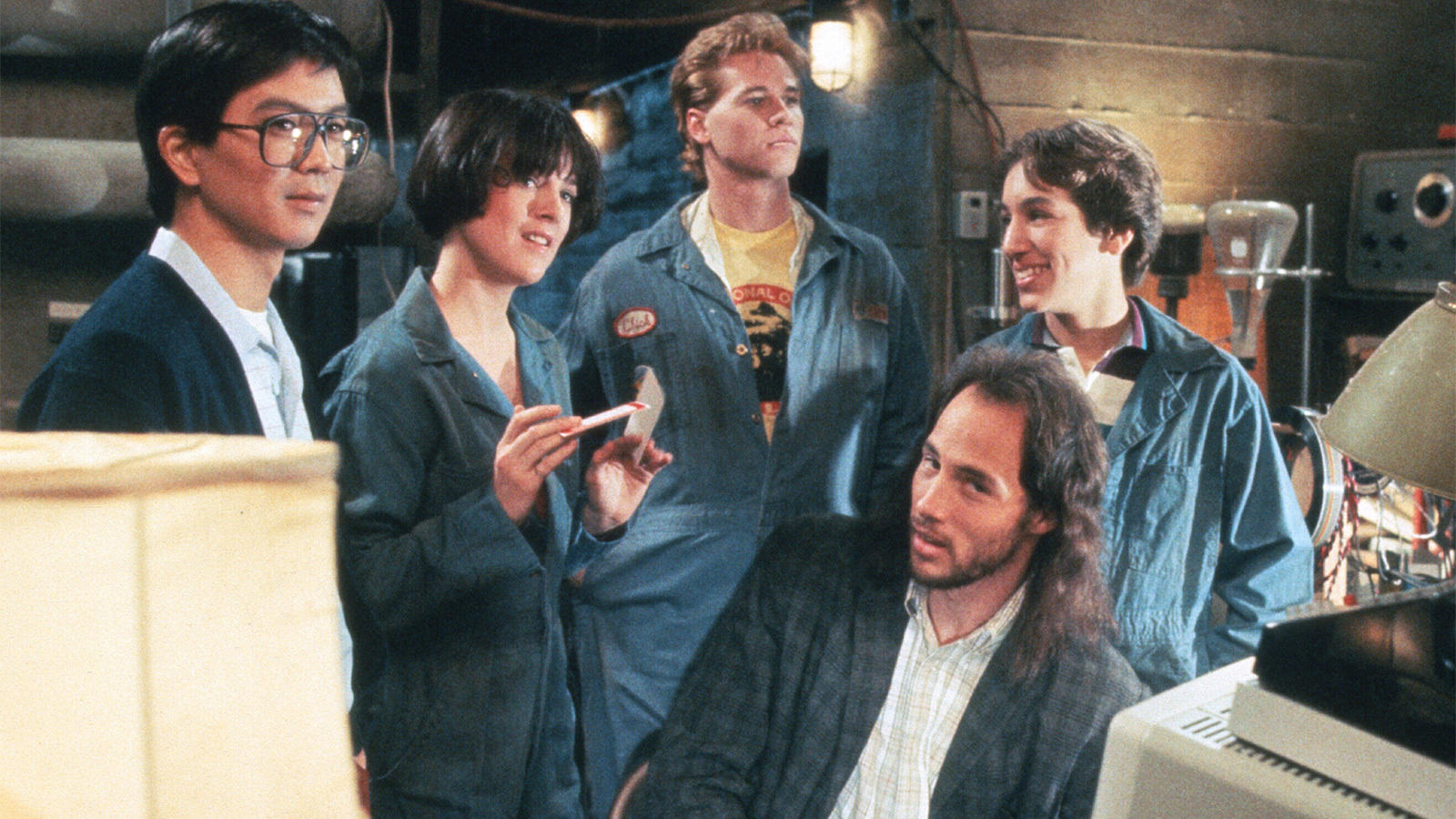The students and Laslo Hollyfeld in Real Genius